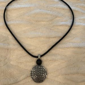 Brand New with tags beautiful silver pendant with black leather rope chain